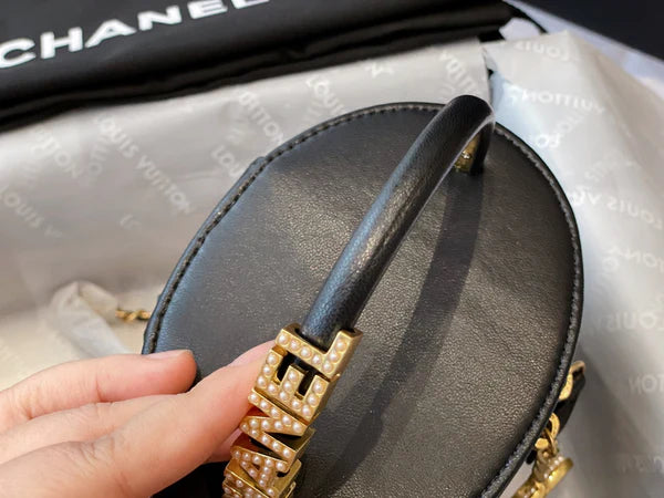 Mini Black Quilted Vanity Bag