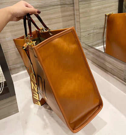 Stylish Oversized Tan Tote Bag with Bold Letter Strap