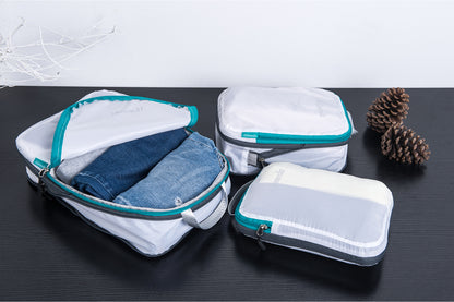 https://alamedamall.com/cdn/shop/products/packing-cube-set-of-3-for-travel-white-main-closeup.jpg?v=1680053031&width=416